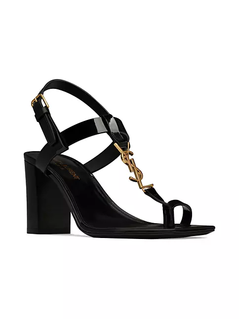Shop Saint Laurent Cassandra Heeled Sandals in Patent Leather with Gold ...